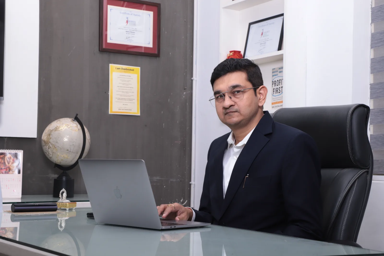 Amit N Jain at his desk