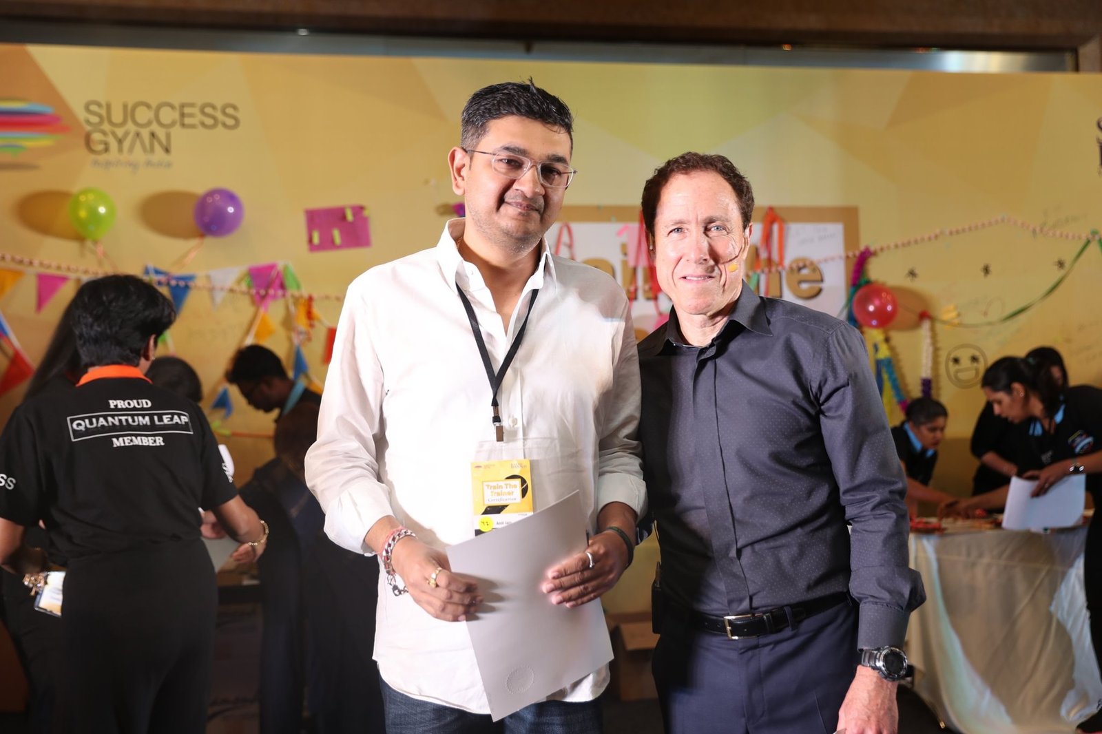 Amit N Jain receiving the Train the Trainer certificate from Blair Singer